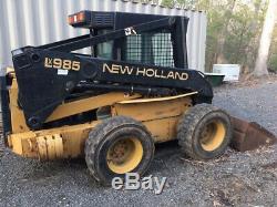 1999 New Holland LX985 Skid Steer Loader with Cab 2 Speed & Weight Kit