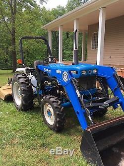 2000 New Holland 1720 4WD tractor with loader and bush hog