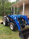 2000 New Holland 1720 4WD tractor with loader and bush hog