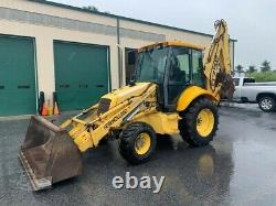 2000 New Holland 575E Tractor Loader Backhoe, 4x4, Cab, Ext, Clean, Work Ready