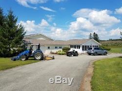2001 New Holland Tractor Boomer TC35D with Cab and Loader/Bucket 4WD Hydrostatic