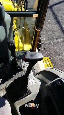 2004 New Holland LB75. B Tractor Loader Backhoe with Cab & Extenda Hoe