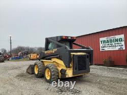 2004 New Holland LS180 Skid Steer Loader with Cab & 2 Speed Clean Machine 900Hrs