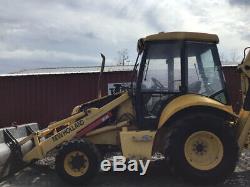 2005 New Holland LB75. B 4x4 Tractor Loader Backhoe with Cab CHEAP