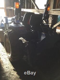 2005 New Holland Tc33da Tractor With Loader And Backhoe Attachment