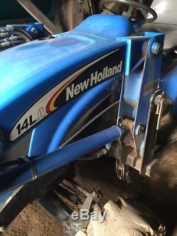 2005 New Holland Tc33da Tractor With Loader And Backhoe Attachment