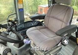 2006 New Holland LB115B-4PS Backhoe Loader with Buckets and Accessories