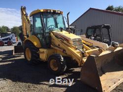 2006 New Holland LB75. B 4x4 Tractor Loader Backhoe with Cab Extend-A-Hoe