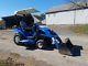 2006 New Holland TZ25DA Compact Tractor with Loader, Belly Mount Lawn Mower Hydro