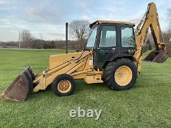 Ford New Holland 555D backhoe tractor loader