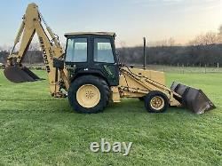 Ford New Holland 555D backhoe tractor loader