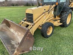 Ford New Holland 555D backhoe tractor loader