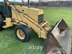 Ford New Holland 555D backhoe tractor loader