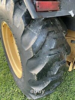 Ford New Holland 555D backhoe tractor loader