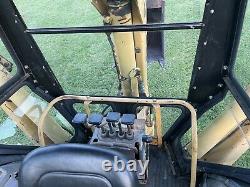 Ford New Holland 555D backhoe tractor loader