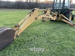 Ford New Holland 555D backhoe tractor loader