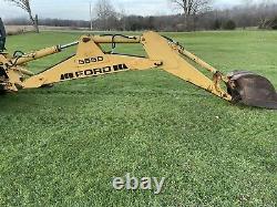 Ford New Holland 555D backhoe tractor loader