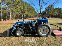 New Holland 4630 turbo tractor with bush hog loader