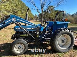 New Holland 4630 turbo tractor with bush hog loader