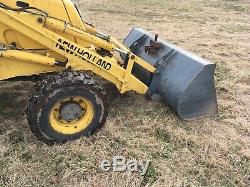 New Holland 555E Loader Tractor