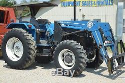 New Holland 7740 4x4 loader with hay spear and bucket