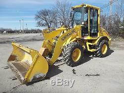 New Holland LW80. B Compact Wheel Loader with Bucket and Forks-937 Original hours