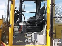 New Holland LW80. B Compact Wheel Loader with Bucket and Forks-937 Original hours