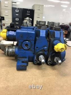 New Holland Loader Valve. Loader valve block off of a New Holland B95TC backhoe