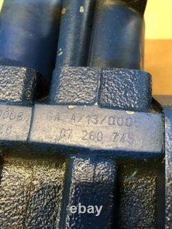 New Holland Loader Valve. Loader valve block off of a New Holland B95TC backhoe
