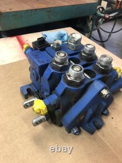 New Holland Loader Valve. Loader valve block off of a New Holland B95TC backhoe