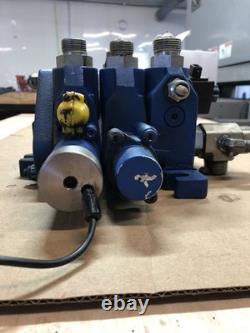 New Holland Loader Valve. Loader valve block off of a New Holland B95TC backhoe