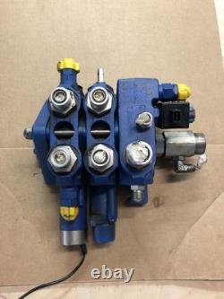 New Holland Loader Valve. Loader valve block off of a New Holland B95TC backhoe