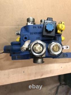 New Holland Loader Valve. Loader valve block off of a New Holland B95TC backhoe