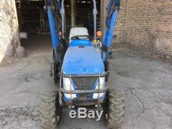 New Holland TC24DA Tractor Loader 4 x 4 1154 hours withaccessories
