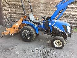 New Holland TC24DA Tractor Loader 4 x 4 Has 1154 hours. With accessories