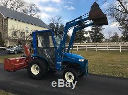 New Holland TC29D Diesel Tractor, 29HP, 4x4, Hydro, Cab, Loader, 3PT Snow Blower