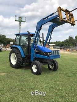 New Holland TS110 Front Loader Ice Cold Air Watch Video