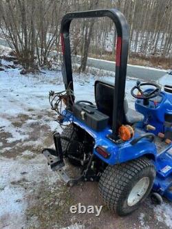 New Holland TZ24DA tractor Sensitrak 4WD (770 hours) with New Holland 60CMS Mower