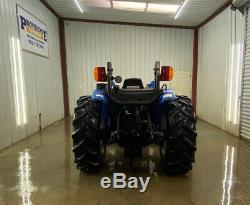 New Holland Tn65 4x4 Tractor Loader With 32la Loader, Front Aux, Rear Aux