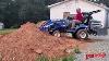 New Holland Wm 25s W Loader Moving Dirt