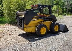 New holland Ls180 skid steer loader runs and operates like it should. 2 speed