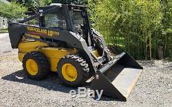 New holland Ls180 skid steer loader runs and operates like it should. 2 speed
