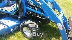 New holland tz25da 4x4 sub compact tractor loader and mower