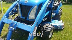 New holland tz25da 4x4 sub compact tractor loader and mower