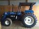 NewHolland 4630 Farm Tractor. With Front End Loader. Fancy As They Come