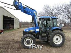 Tractor New Holland TD5050 4WD with 820TL loader and cab with air/heat